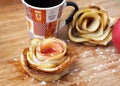 Home cooking Ã¢â¬â rose-shaped apple tarts Royalty Free Stock Photo